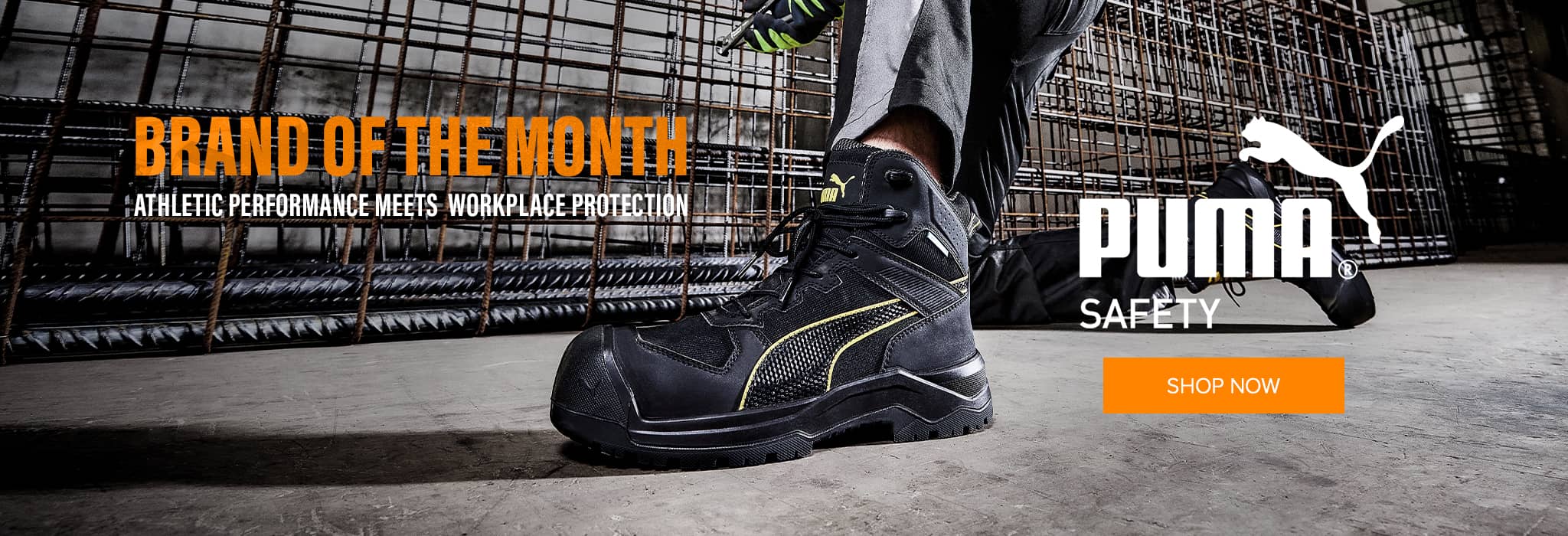 Promotional banner for Puma Safety featuring Puma Safety Rock Heavy Duty Waterproof Boot S7S in black and yellow. Text: "Brand of the Month" and "Athletic Performance Meets Workplace Protection."